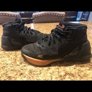 UA Curry  Bronze and Black Youth Size 3.